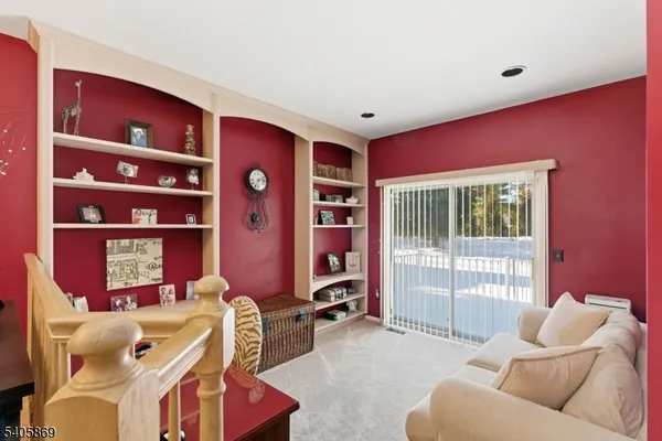 a livingroom with a large window