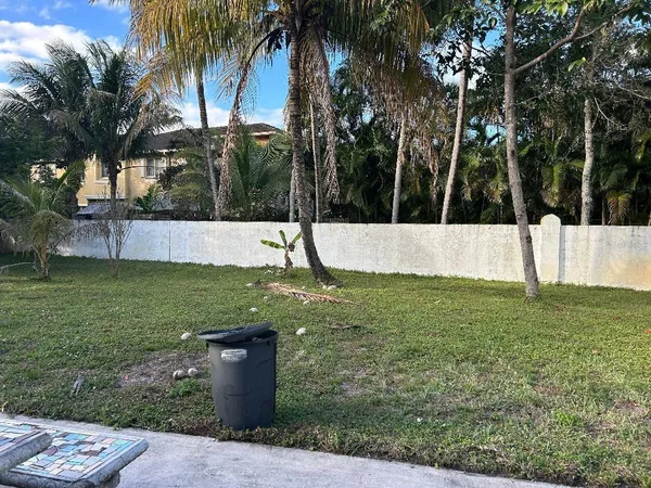 a view of a garden with a slide