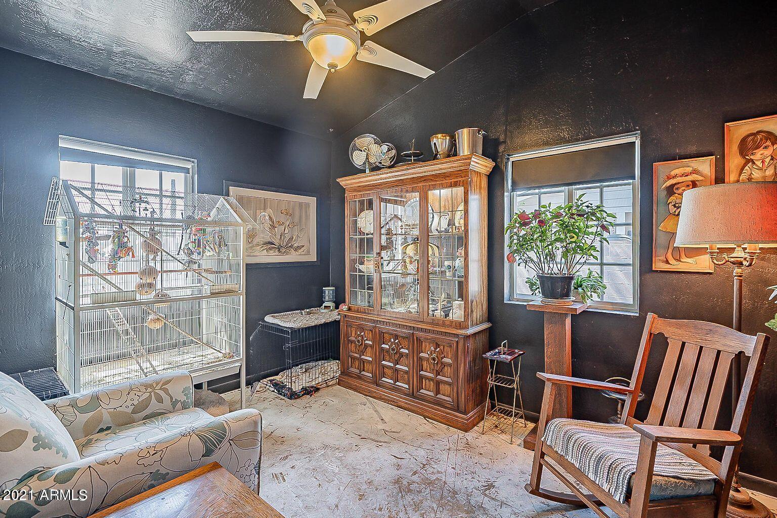9416 North 3rd Avenue Phoenix, AZ 85021 - Photo 11 of 25 a living room with furniture and a window
