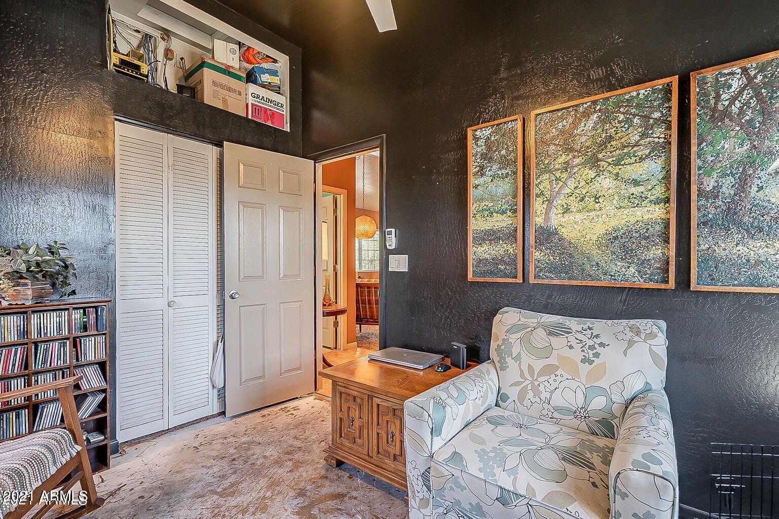 9416 North 3rd Avenue Phoenix, AZ 85021 - Photo 12 of 25 a living room with furniture and a window