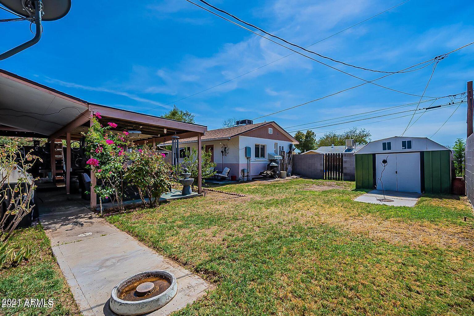 9416 North 3rd Avenue Phoenix, AZ 85021 - Photo 16 of 25 a view of a house with backyard and sitting area