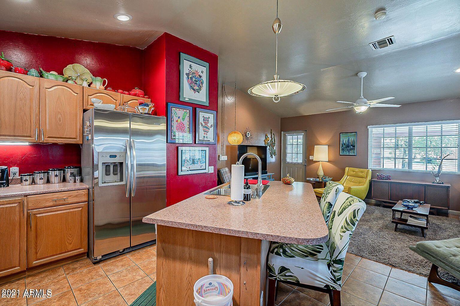 9416 North 3rd Avenue Phoenix, AZ 85021 - Photo 7 of 25 a view of a dining room with furniture window and outside view