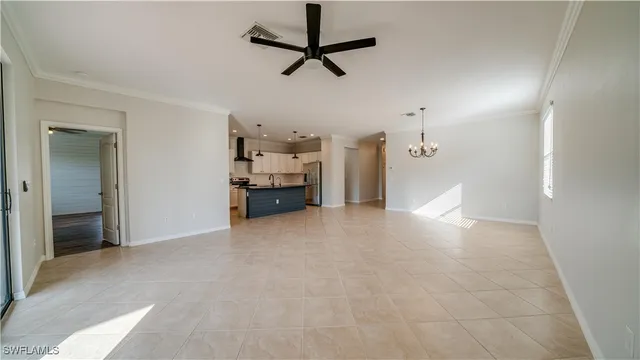 a view of a livingroom with a ceiling fan