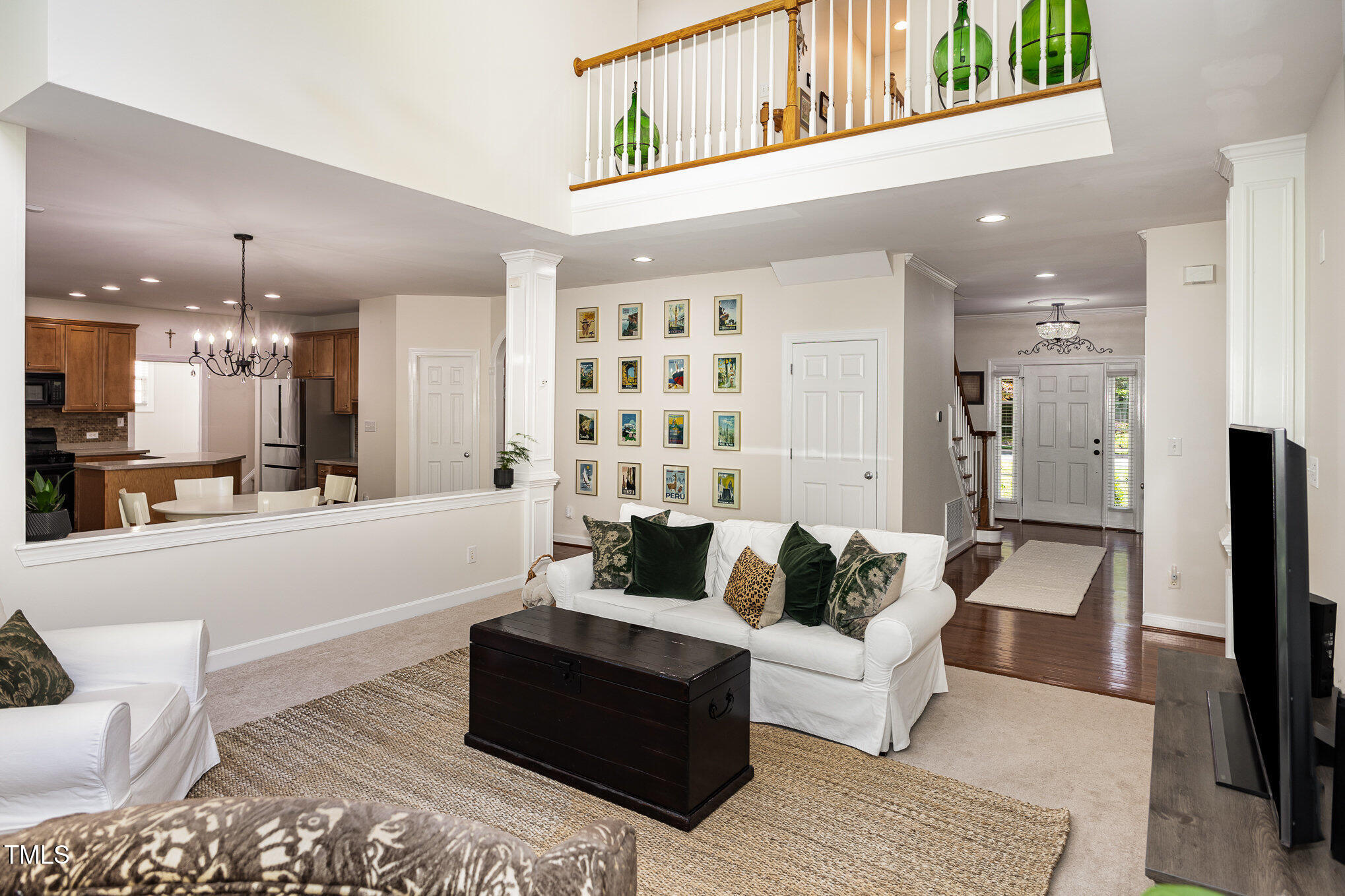 1603 Timber Wolf Drive Durham, NC 27713 - Photo 11 of 41 a living room with furniture and a flat screen tv