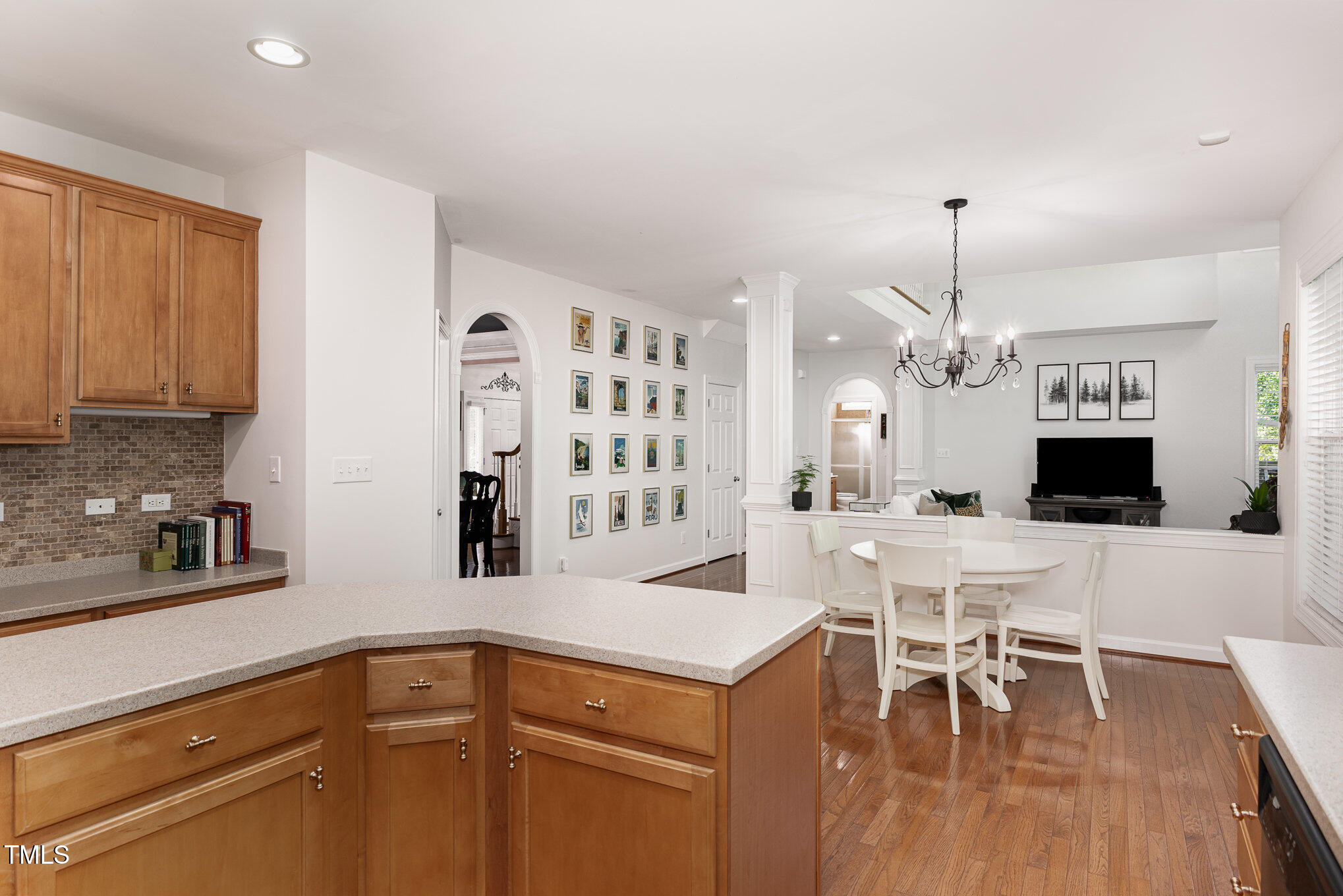1603 Timber Wolf Drive Durham, NC 27713 - Photo 15 of 41 a kitchen with a cabinets and chairs