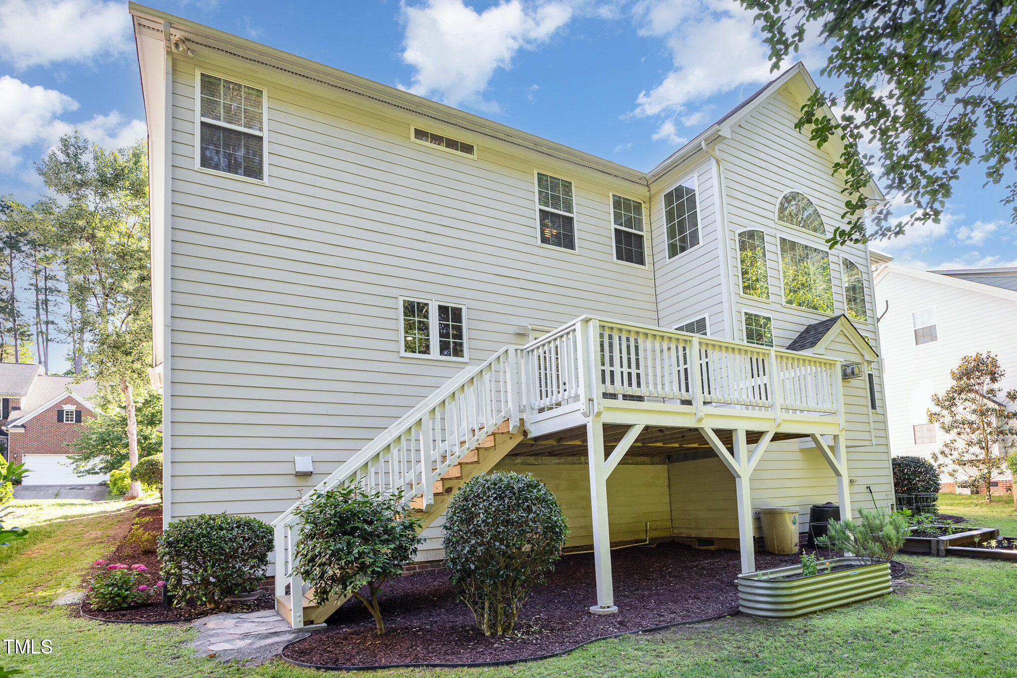 1603 Timber Wolf Drive Durham, NC 27713 - Photo 34 of 41 a front view of a house with a garden
