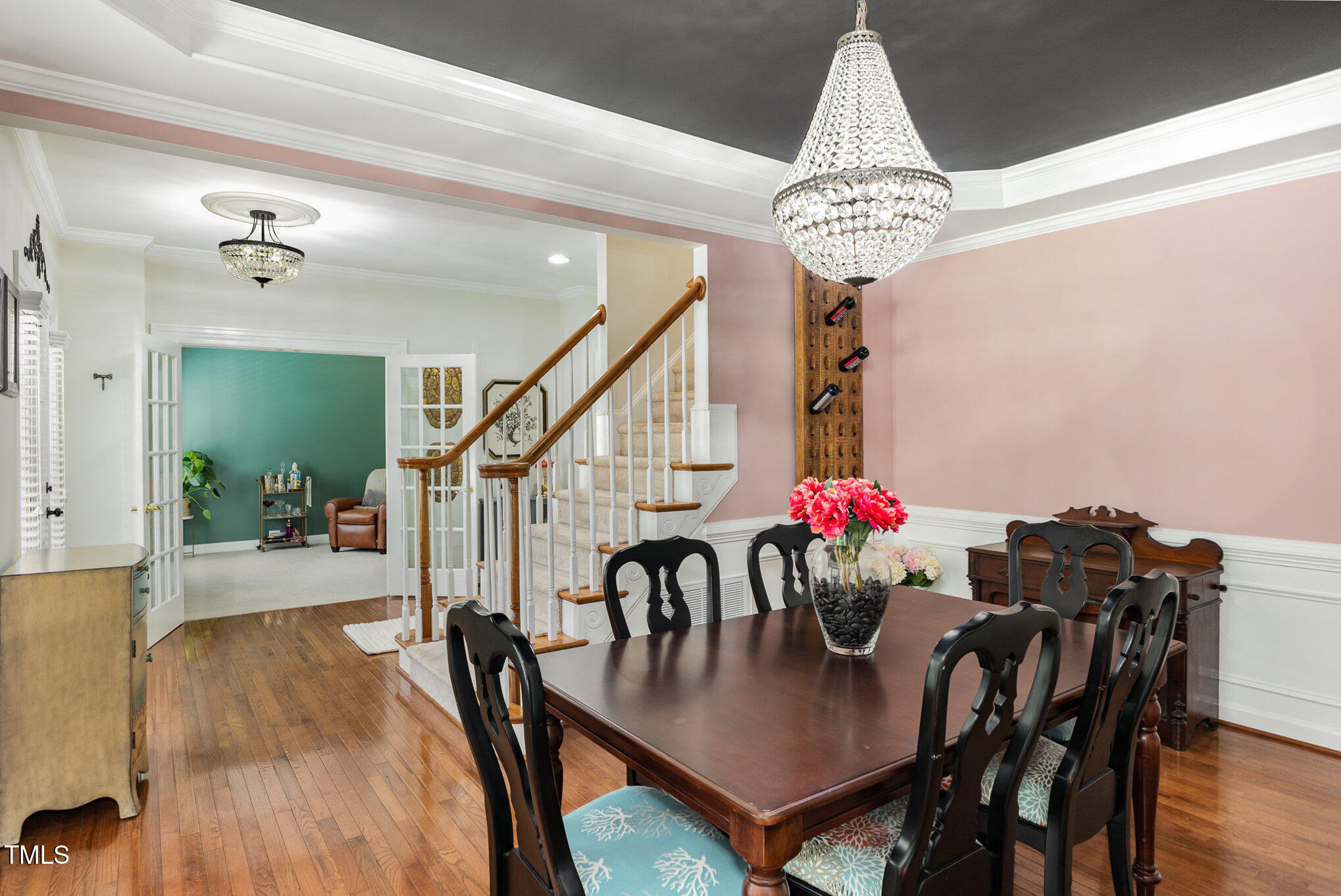 1603 Timber Wolf Drive Durham, NC 27713 - Photo 7 of 41 a view of a dining room with furniture and wooden floor