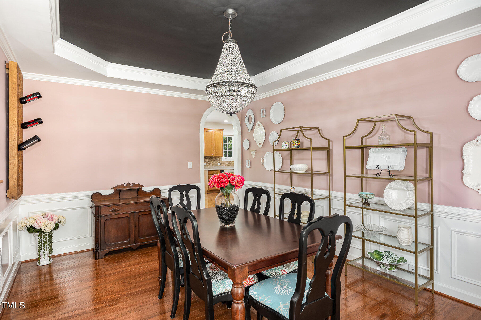 1603 Timber Wolf Drive Durham, NC 27713 - Photo 8 of 41 a view of a dining room with furniture and wooden floor