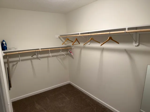 a view of a room with racks on the wall
