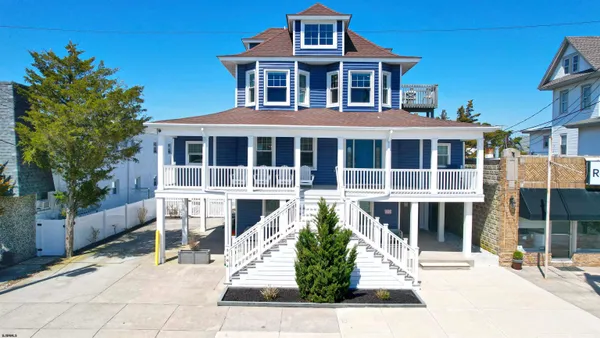 a front view of a house with a patio