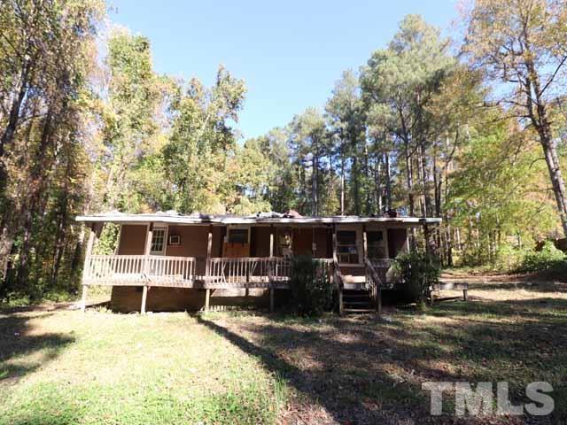 1642 Gate 2 Road Creedmoor, NC 27522 - Photo 3 of 11 a view of a house with backyard porch and sitting area