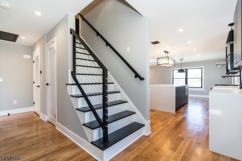 76 Burnet Road, Unit 2 Florham Park, NJ 07940 - Photo 16 of 24 a view of entryway and hall with wooden floor