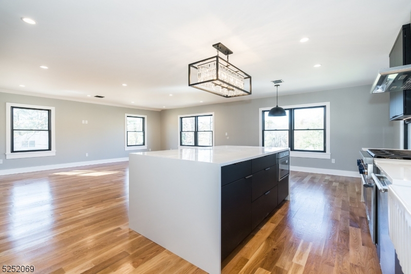 76 Burnet Road, Unit 2 Florham Park, NJ 07940 - Photo 5 of 24 a view of kitchen and wooden floor