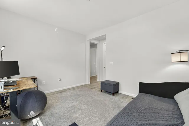 a kitchen with stainless steel appliances granite countertop a stove a refrigerator and a microwave