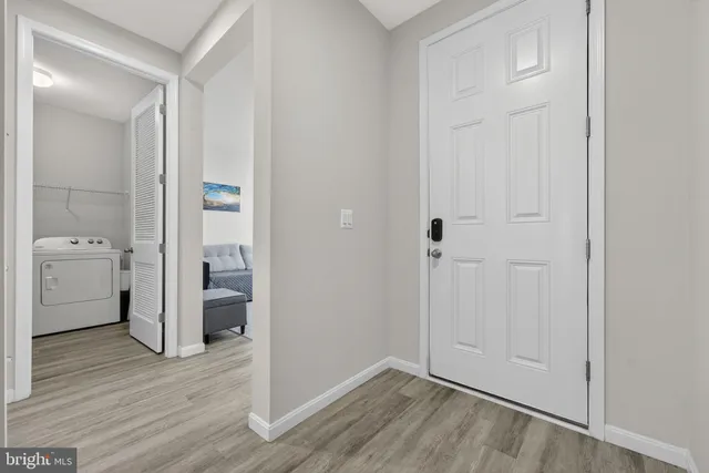 a view of workspace with wooden floor