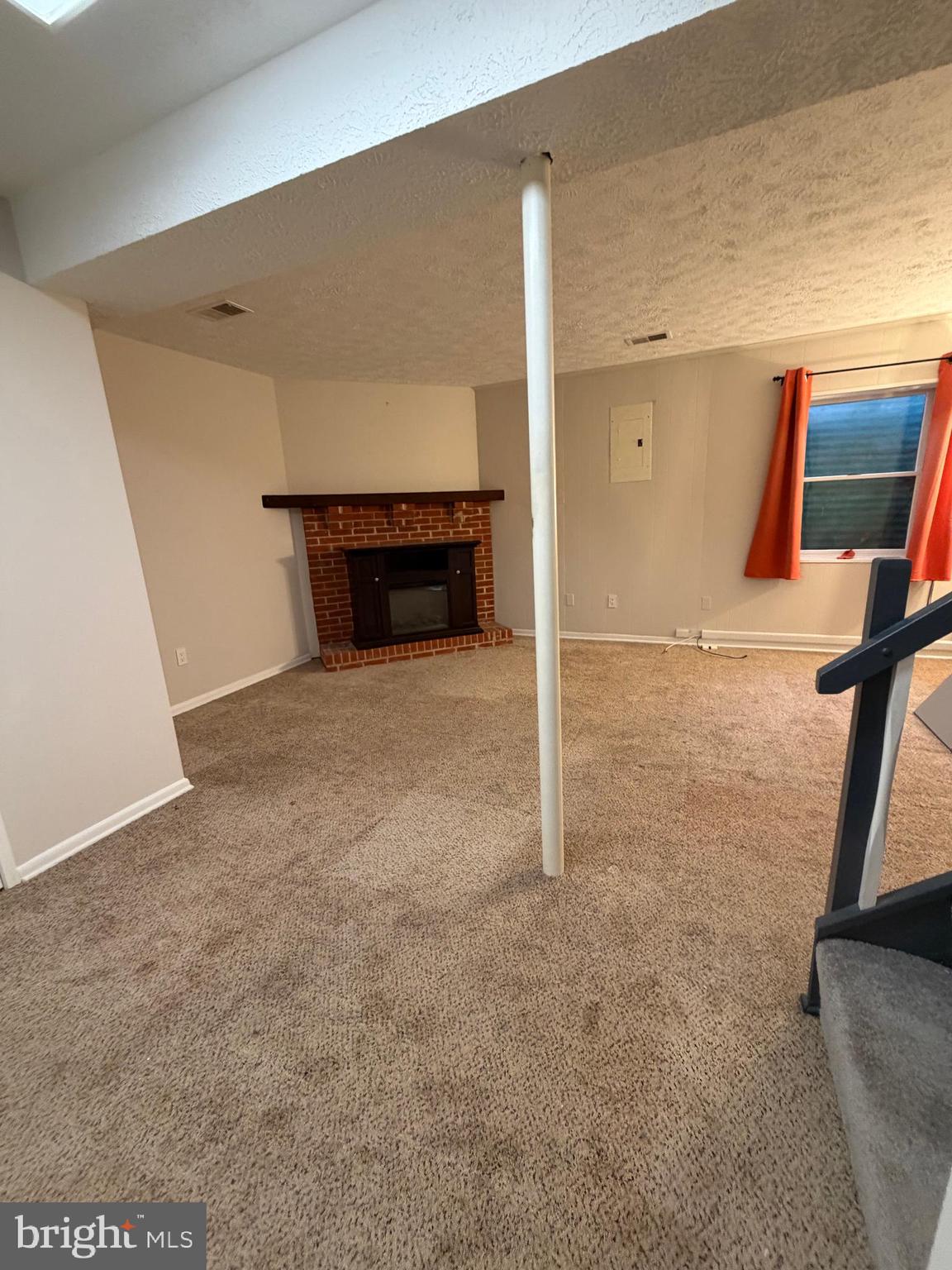 327 James Street Falls Church, VA 22046 - Photo 25 of 35 Basement and Electric Fireplace