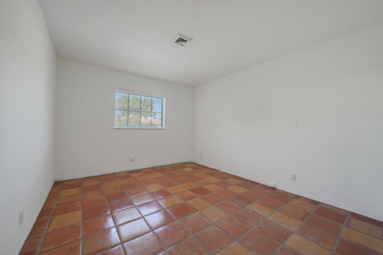7 Southeast Paddock Circle Jupiter, FL 33469 - Photo 24 of 32 Third Bedroom