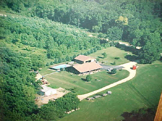 6503 West Henry Road Polo, IL 61064 - Photo 1 of 7 an aerial view of a house with a yard