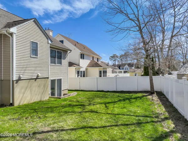 a view of a back yard of the house