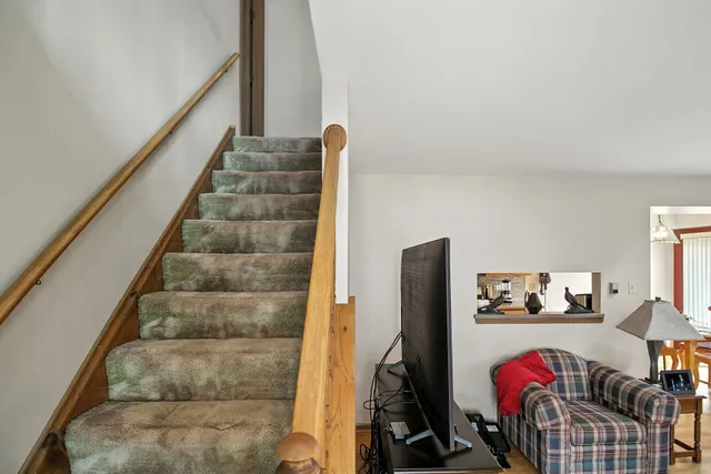 a view of entryway with stairs and furniture