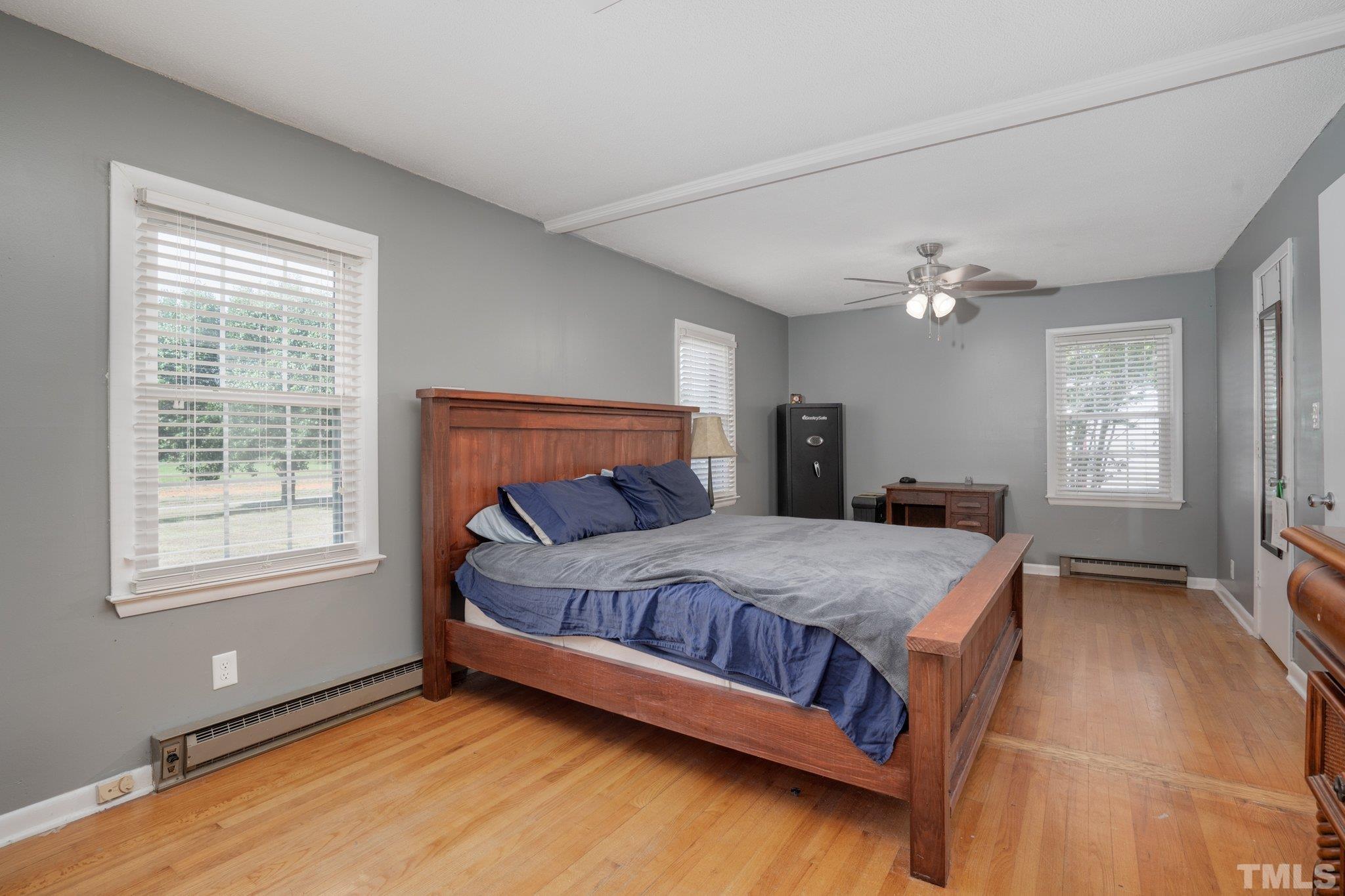 617 3rd Street Spring Hope, NC 27882 - Photo 6 of 23 a bedroom with a bed and window