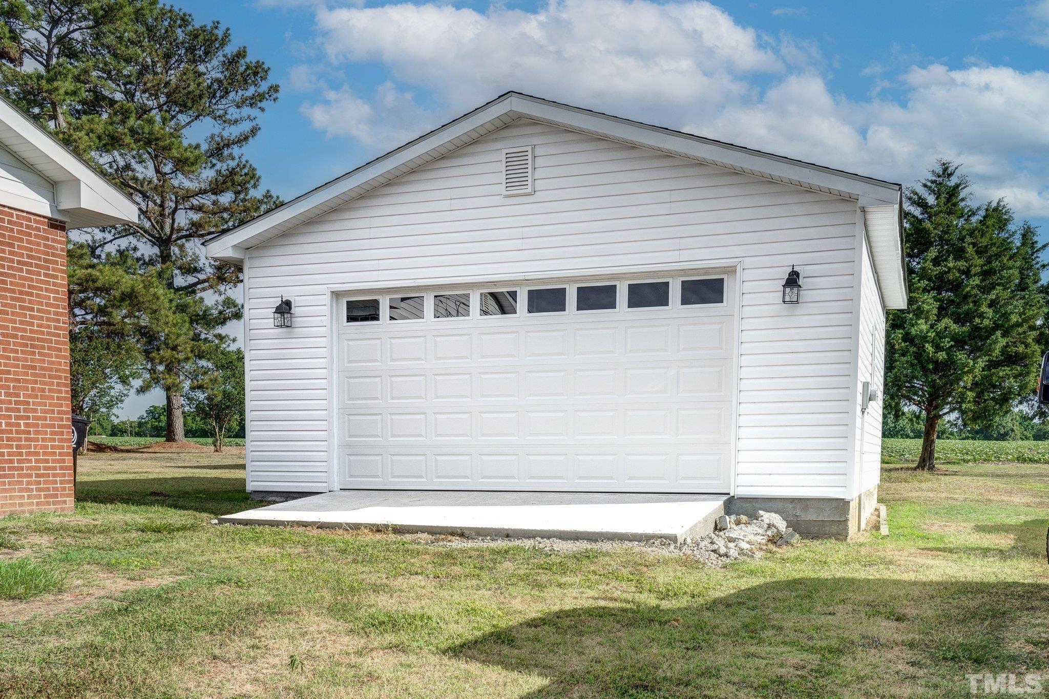 617 3rd Street Spring Hope, NC 27882 - Photo 7 of 23 a front view of a house with a yard