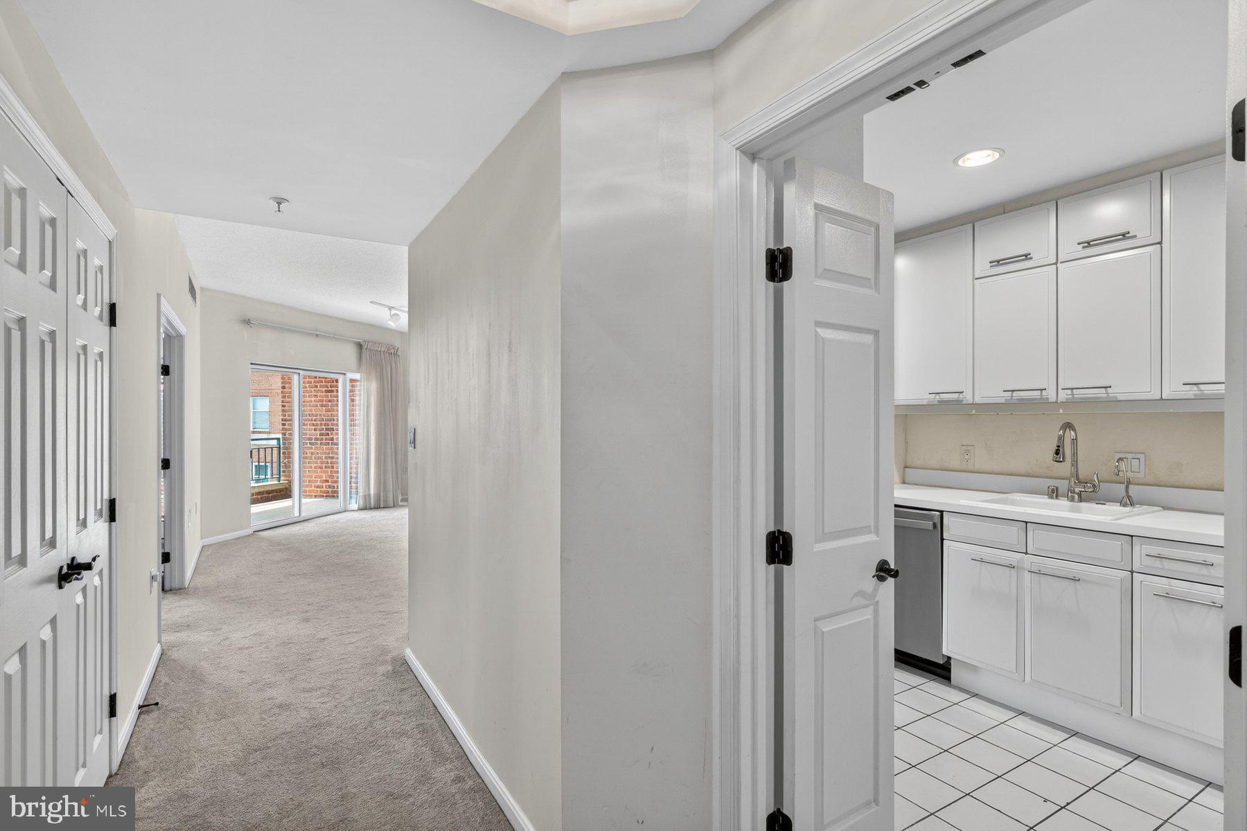 3801 Canterbury Road, Unit 403 Baltimore, MD 21218 - Photo 2 of 25 Modern entryway with kitchen access.
