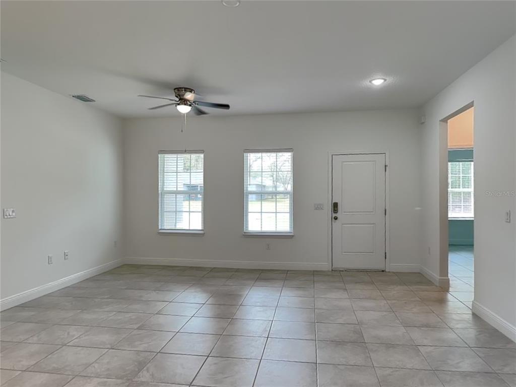 8809 North Sandree Drive Citrus Springs, FL 34434 - Photo 2 of 16 a view of an empty room with a window