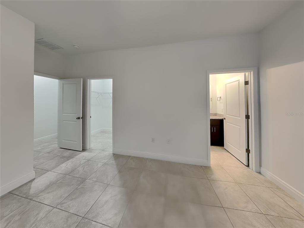 8809 North Sandree Drive Citrus Springs, FL 34434 - Photo 6 of 16 an empty room with a bathroom and a sink