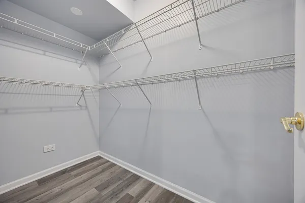 a view of a room with racks on the wall