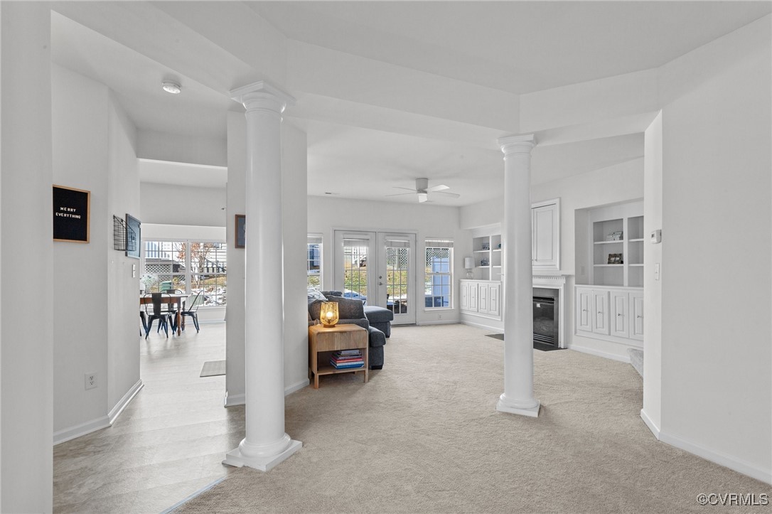4405 Acoma Circle Williamsburg, VA 23188 - Photo 13 of 44 a living room with furniture a dining table and chairs