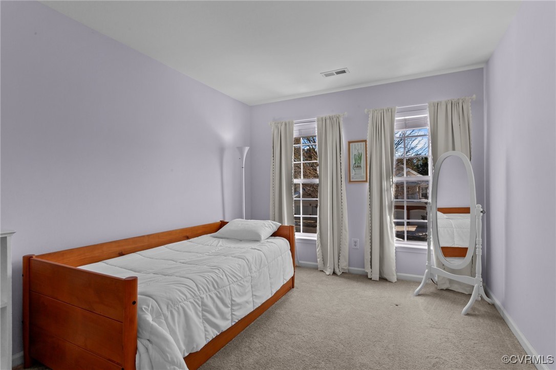 4405 Acoma Circle Williamsburg, VA 23188 - Photo 26 of 44 a bedroom with a bed and closet