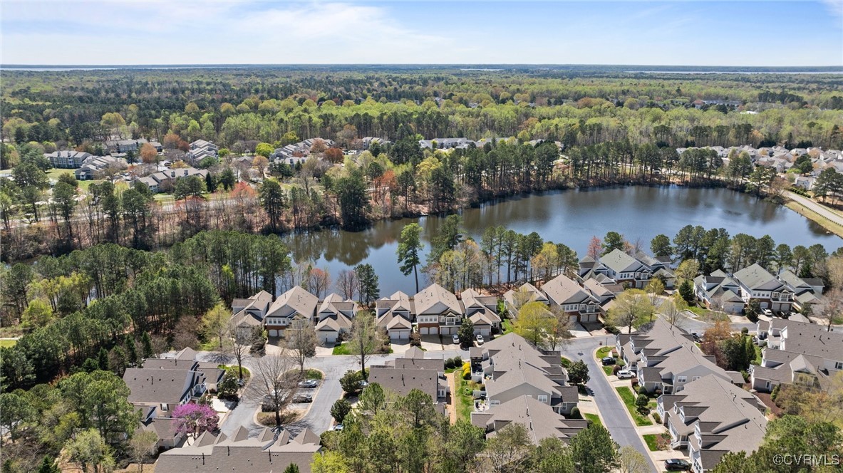 4405 Acoma Circle Williamsburg, VA 23188 - Photo 37 of 44 an aerial view of a houses with a lake view
