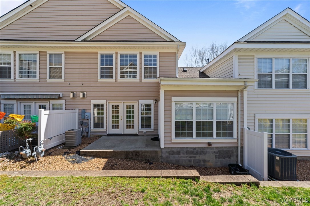4405 Acoma Circle Williamsburg, VA 23188 - Photo 41 of 44 a front view of a house with a yard outdoor seating and barbeque oven