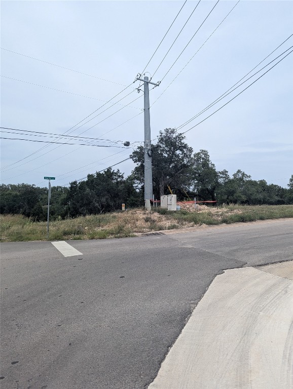 Lot 2 Hamilton Pool Road Bee Cave, TX 78738 - Photo 2 of 14 a view of a road with a building in the background