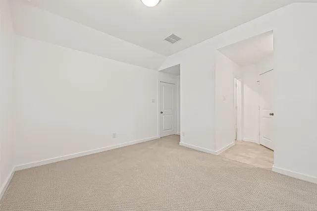 an empty room with an entryway