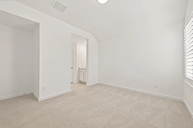 an empty room with an entryway