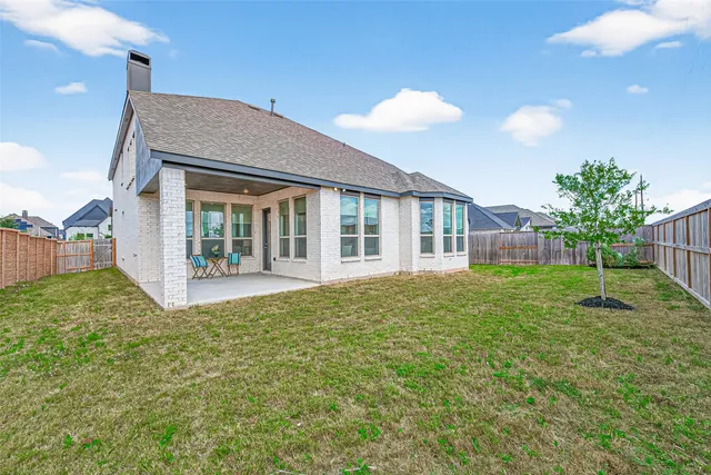 a house view with a garden space