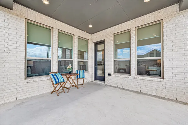 a view of an outdoor space with porch and furniture