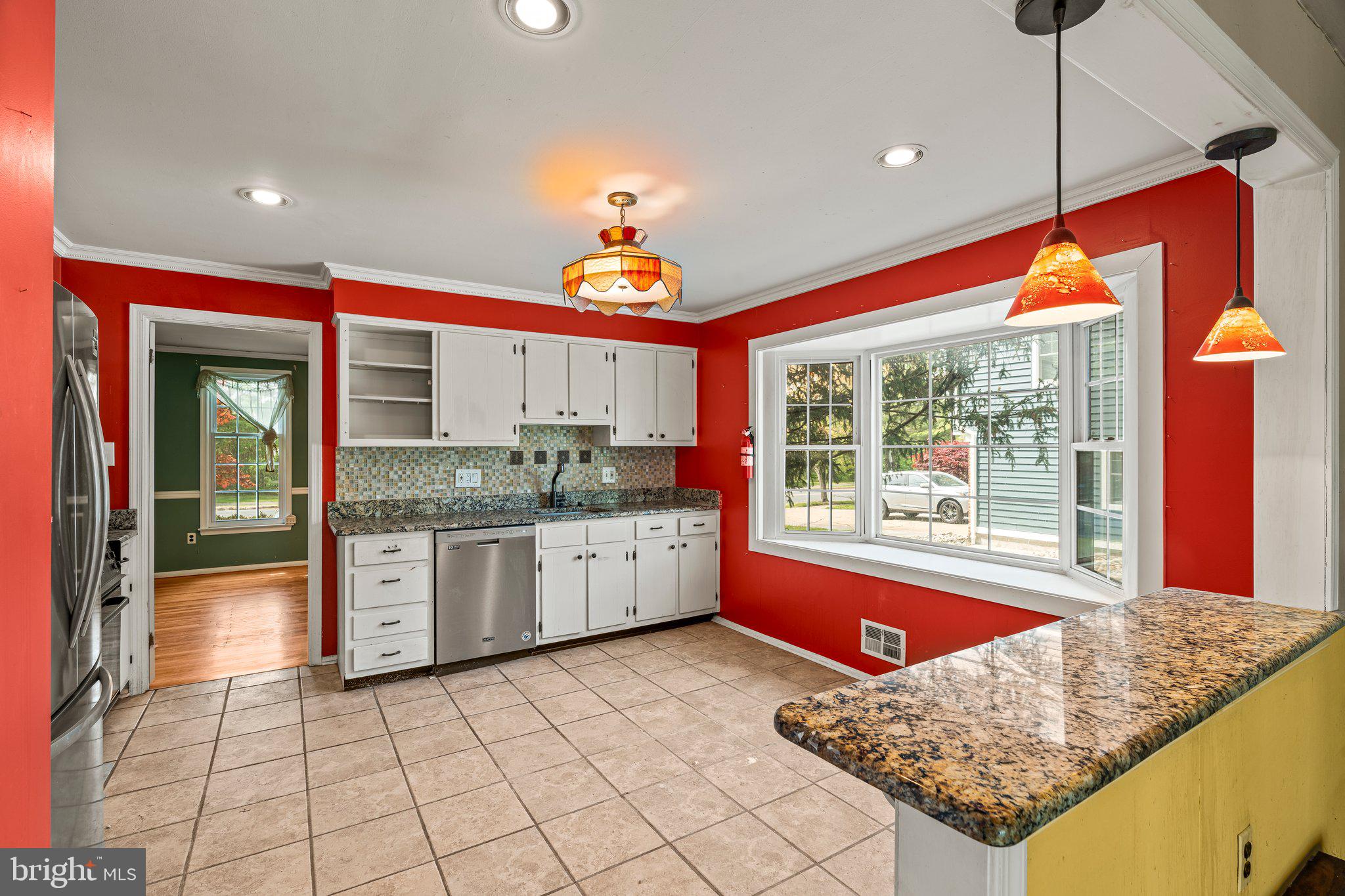 304 Bortons Mill Road Cherry Hill, NJ 08034 - Photo 11 of 35 a kitchen with a stove a sink and cabinets