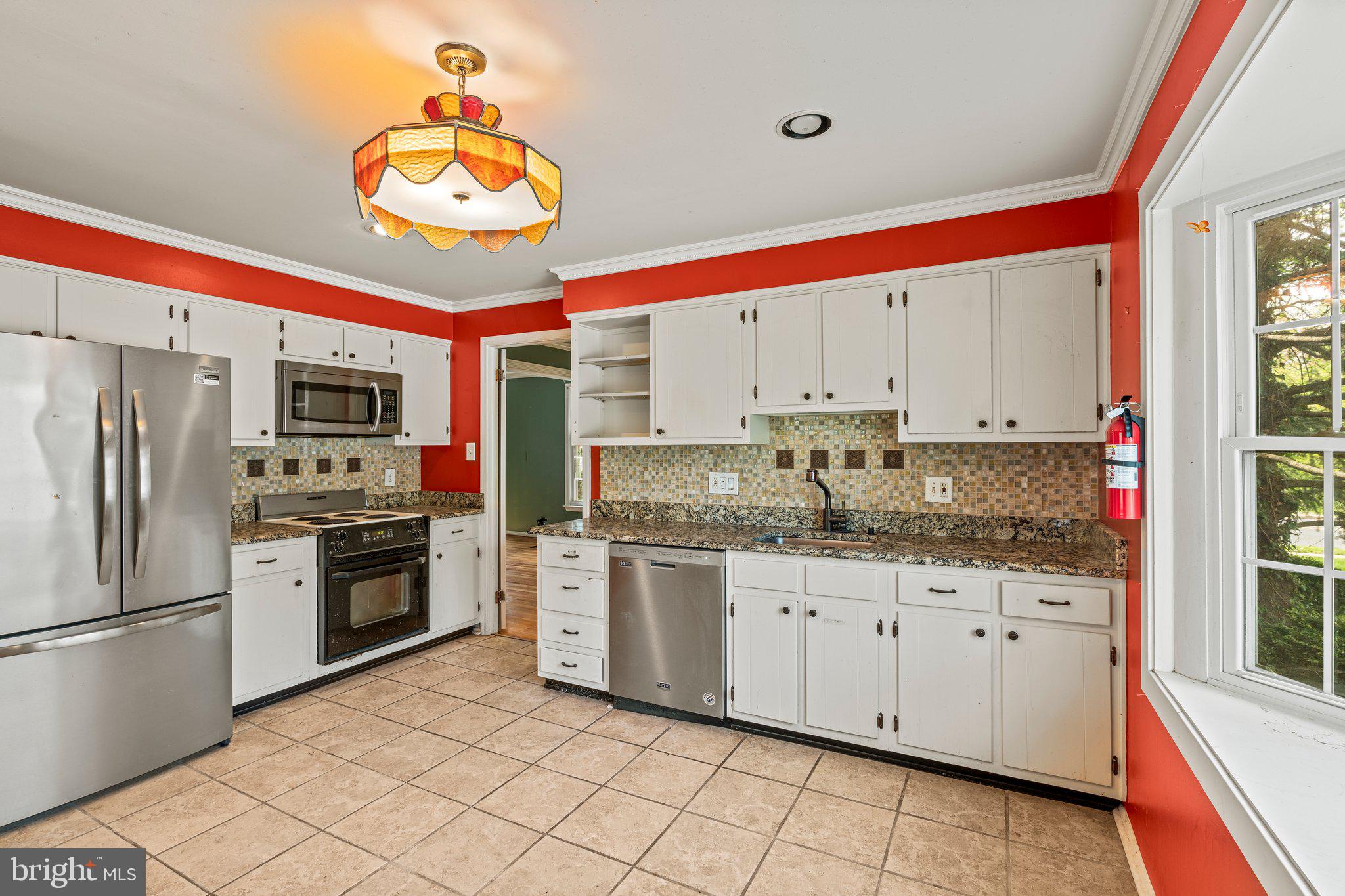 304 Bortons Mill Road Cherry Hill, NJ 08034 - Photo 13 of 35 a kitchen with stainless steel appliances granite countertop a sink and cabinets