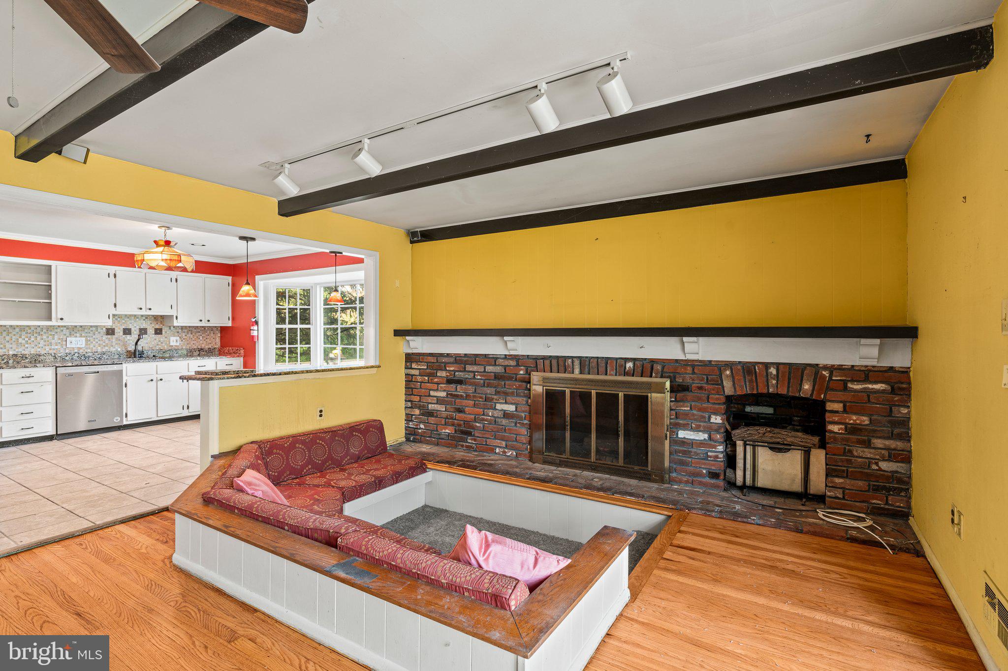 304 Bortons Mill Road Cherry Hill, NJ 08034 - Photo 16 of 35 a living room with stainless steel appliances kitchen island granite countertop furniture and rug floor