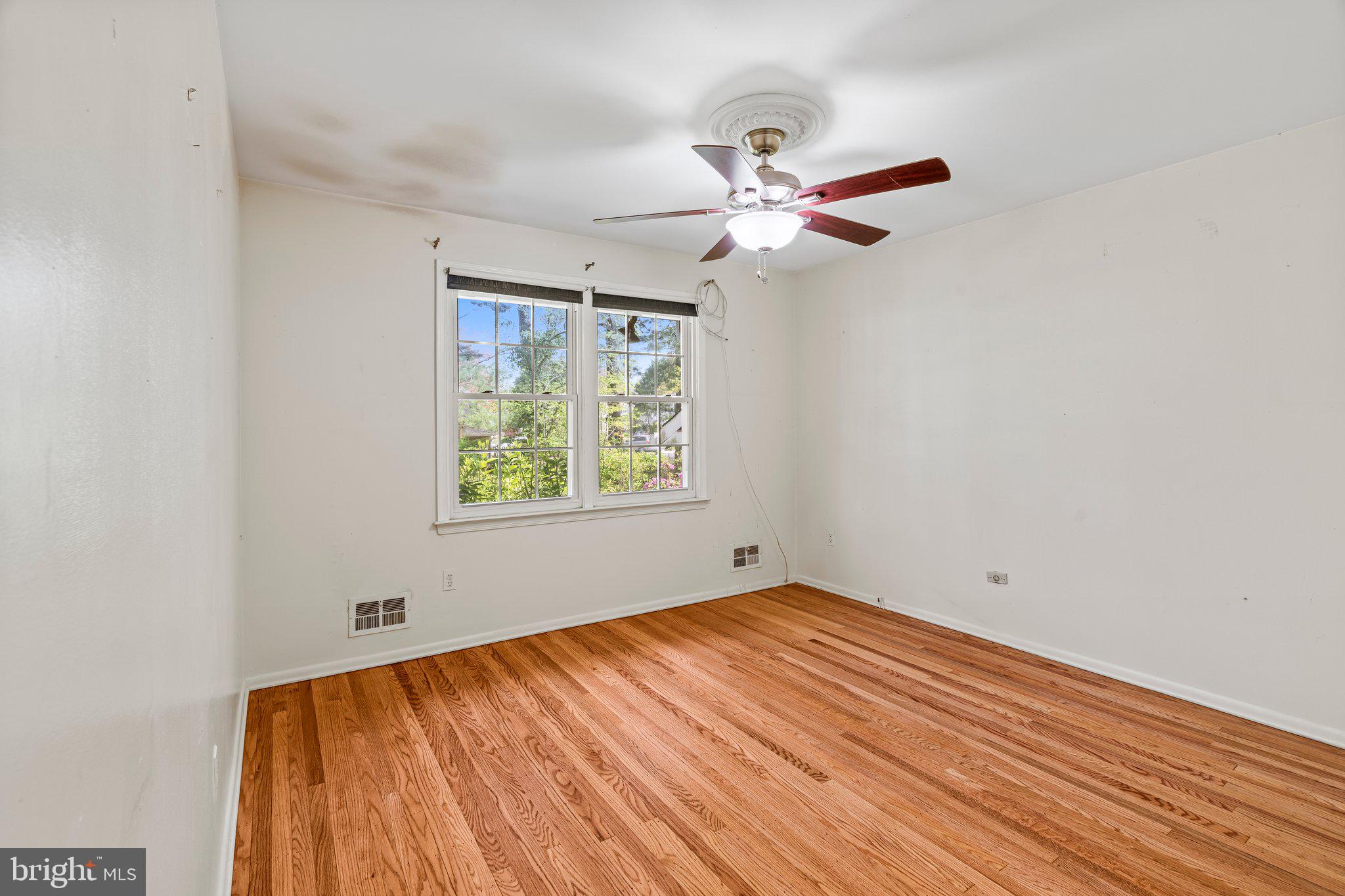 304 Bortons Mill Road Cherry Hill, NJ 08034 - Photo 18 of 35 wooden floor in an empty room with a window