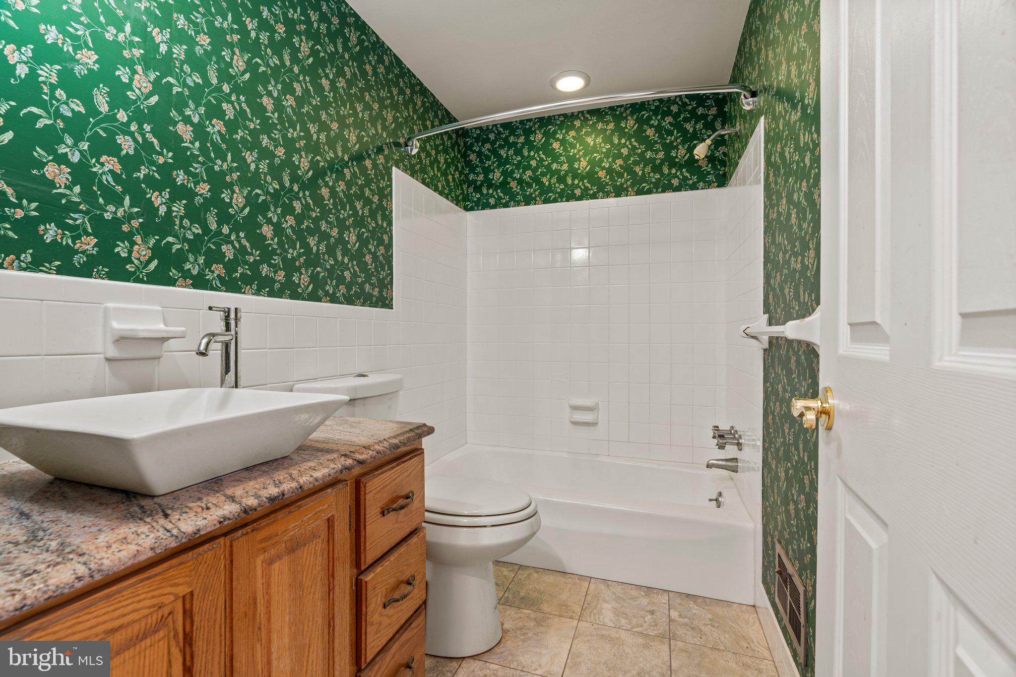 304 Bortons Mill Road Cherry Hill, NJ 08034 - Photo 26 of 35 a bathroom with a granite countertop sink a toilet and bathtub
