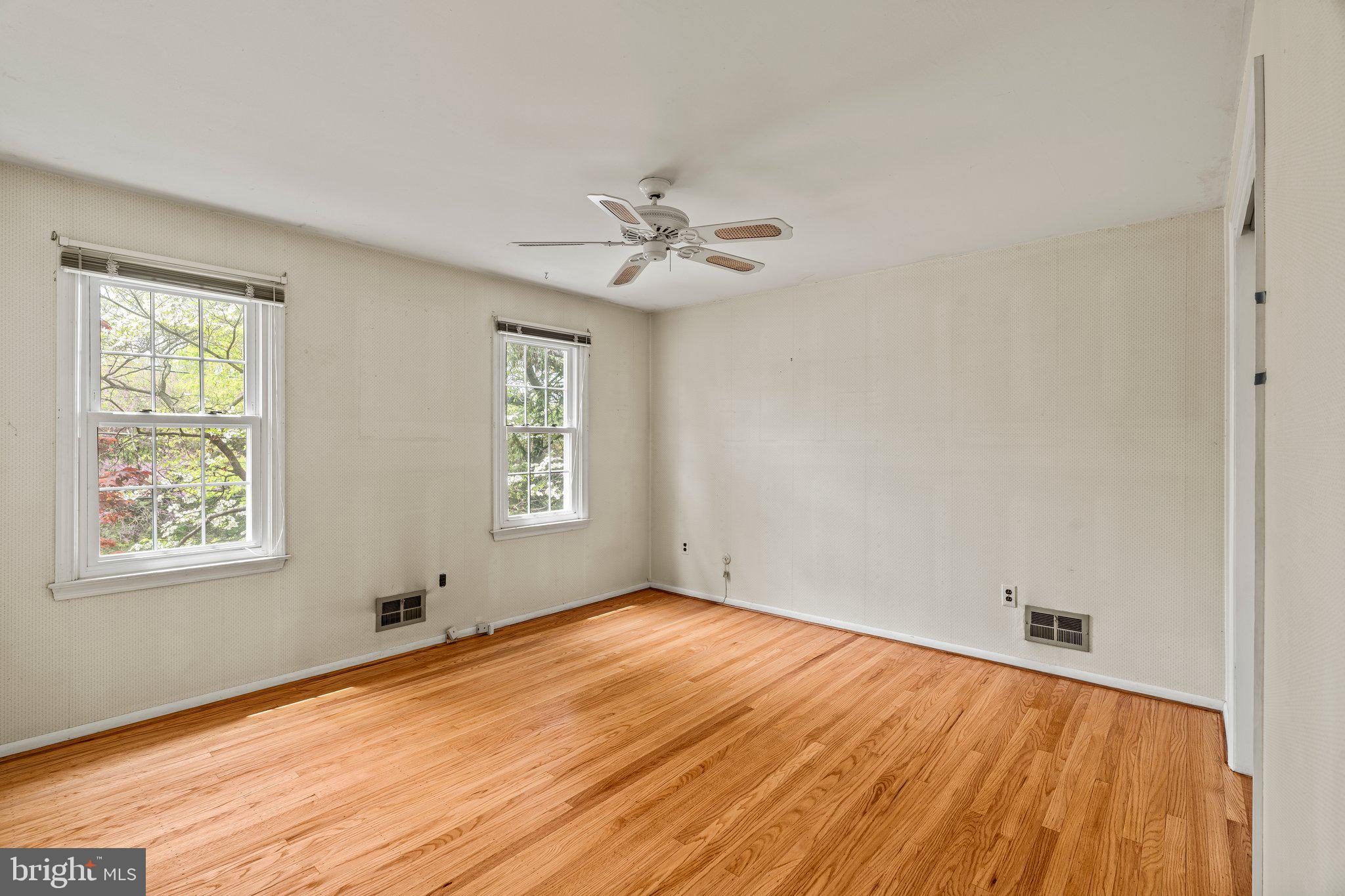304 Bortons Mill Road Cherry Hill, NJ 08034 - Photo 27 of 35 a view of empty room with wooden floor and fan