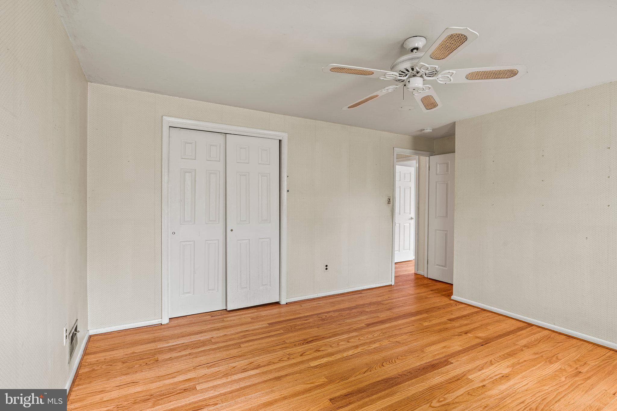 304 Bortons Mill Road Cherry Hill, NJ 08034 - Photo 28 of 35 a view of an empty room with wooden floor