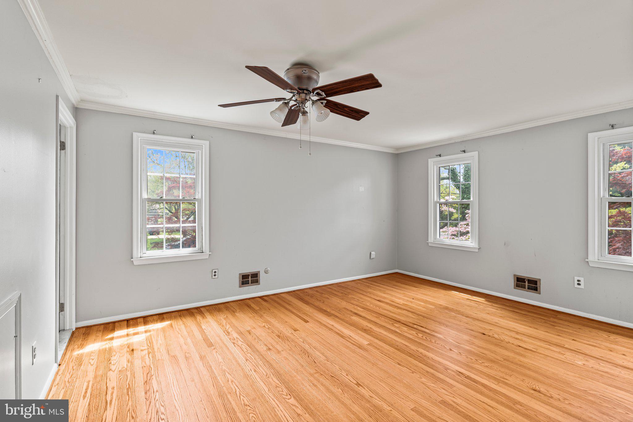 304 Bortons Mill Road Cherry Hill, NJ 08034 - Photo 29 of 35 a view of empty room with wooden floor and fan