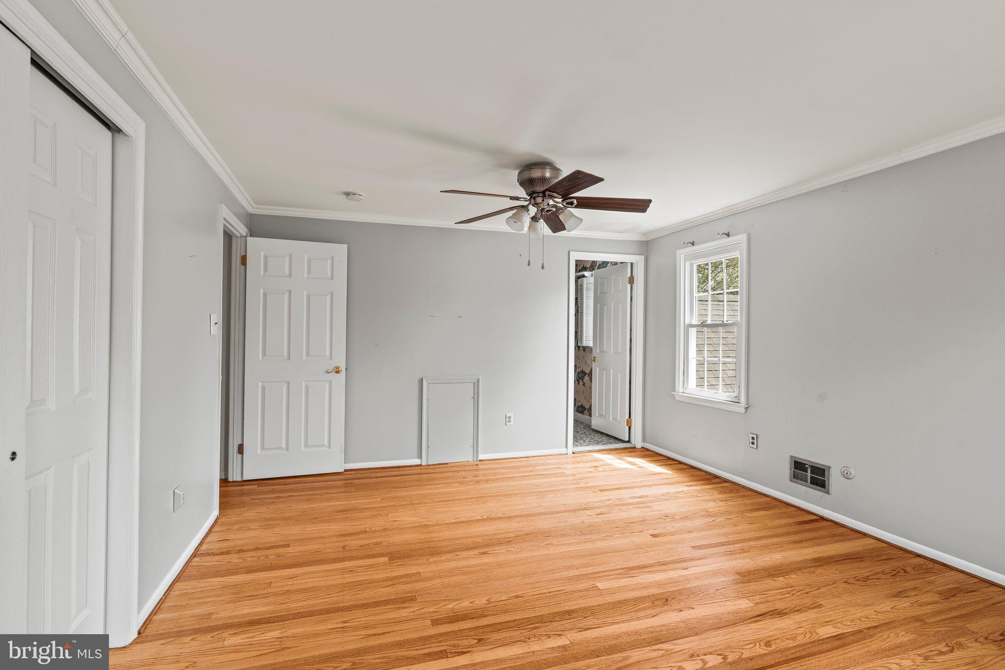 304 Bortons Mill Road Cherry Hill, NJ 08034 - Photo 31 of 35 a big room with wooden floor and windows