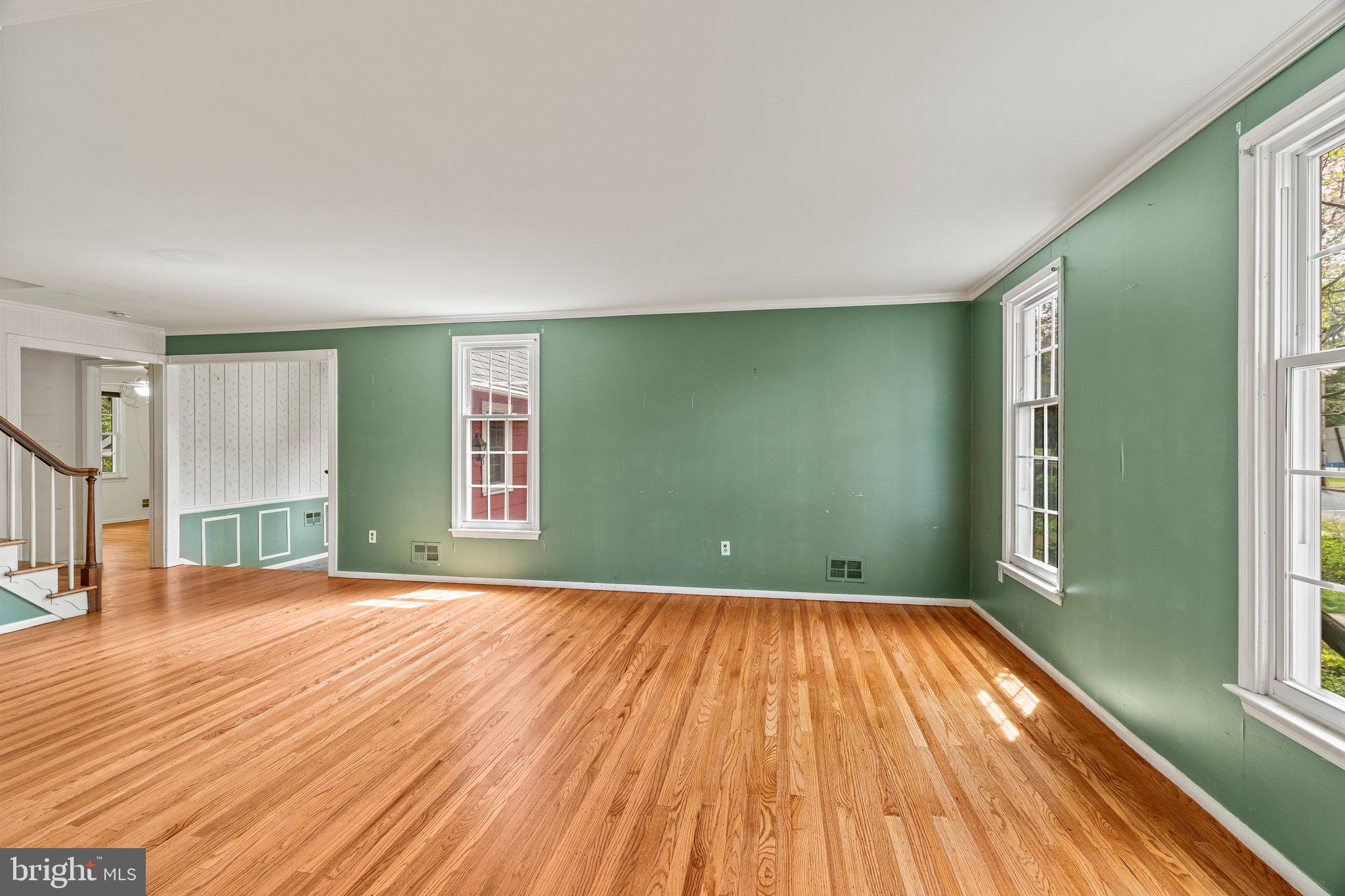 304 Bortons Mill Road Cherry Hill, NJ 08034 - Photo 8 of 35 a view of an empty room with window and wooden floor