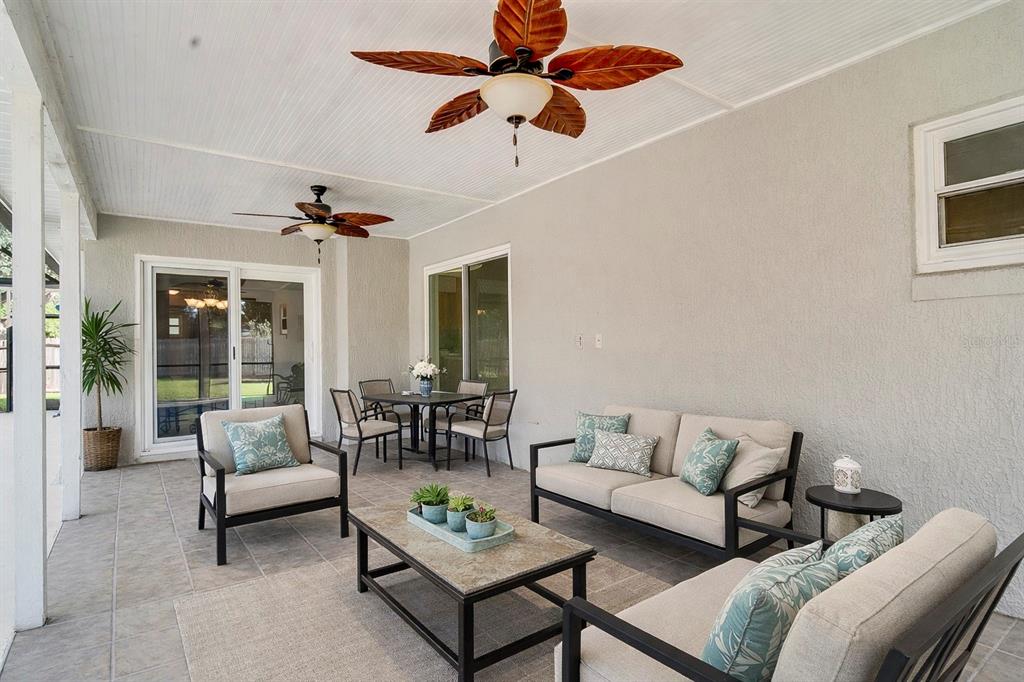 1504 East Spring Ridge Circle Winter Garden, FL 34787 - Photo 17 of 21 a living room with furniture and a large window
